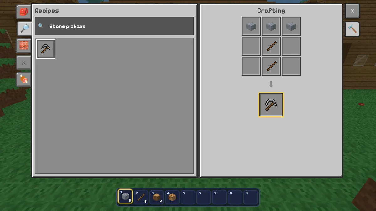A stone pickaxe in the crafting grid
